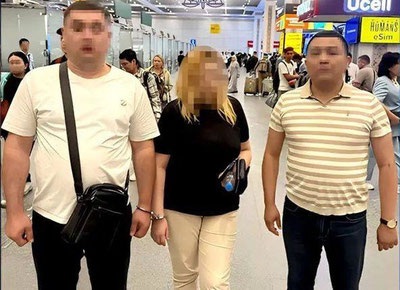'Халқаро қидирувга берилган аёл БААдан депортация қилинди'ning rasmi