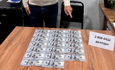 'Ҳоким ёрдамчиси ишга киритиб қўйишни ваъда қилиб, пора талаб қилганликда айбланиб ушланди'ning rasmi