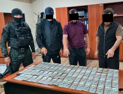 'Самарқандда 7,4 минг долларлик қалбаки пул 44 миллион сўмга сотилди'ning rasmi