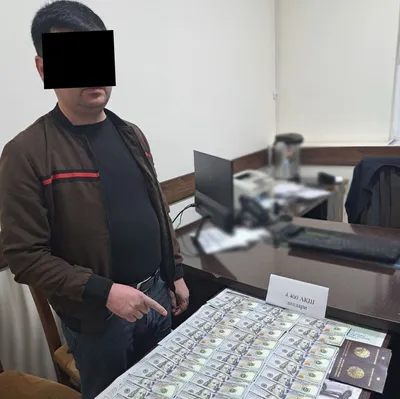 'Полшага ишга юбормоқчи бўлган МЧЖ раҳбари 10,4 минг доллар талаб қилиб қўлга тушди'ning rasmi